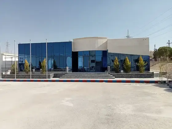 ACWA Power Zarqa administration building with blue glass facade